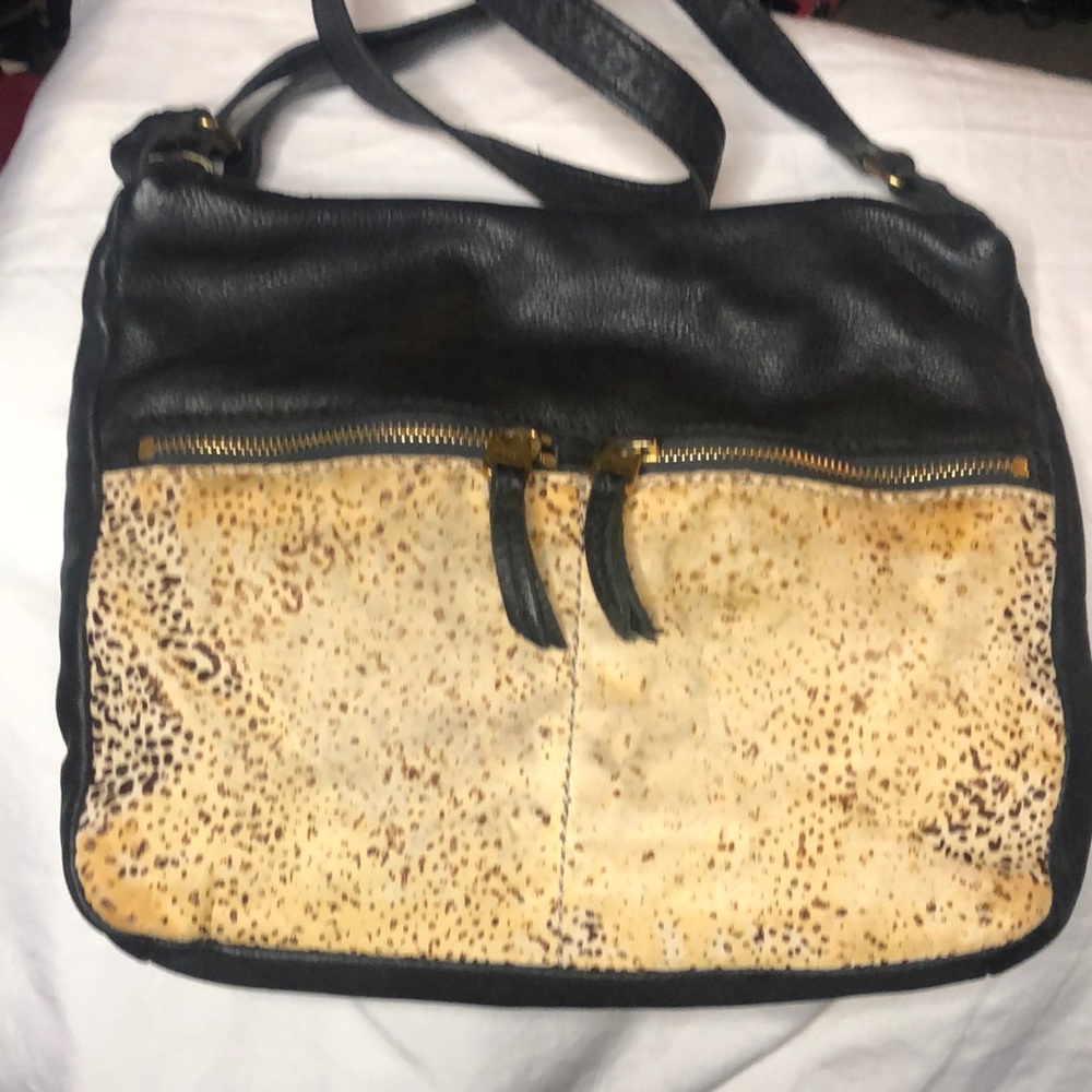 FOSSIL black and tan cowhide leather animal print crossbody bag.